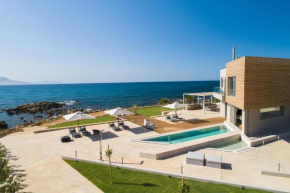 An intimate Villa Resort- Right on the beach, by ThinkVilla